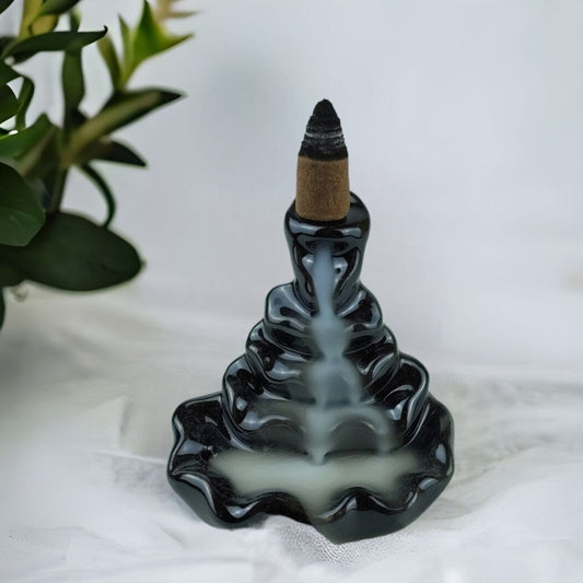 4-Tier Ripple Backflow Incense Burner - You'll be mesmerised by this backflow incense burner which is designed so that the smoke flows down each of the four tiers to pool at the bottom