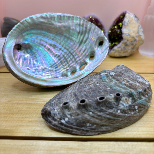 Beautiful large abalone shell, commonly used with sage smudge sticks for space and aura clearing. Most people recognise Abalone as being a shell used for smudging...however it does have its own healing qualities - good for the eyes, aids detoxing, reduces physical tension and helps build physical strength. Good for love, relaxation and letting go of emotions