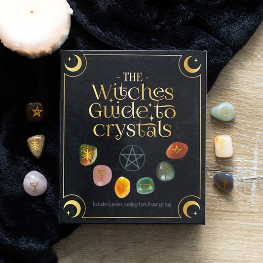 This witches guide to crystals gift set includes everything needed to cast stones for divination. Use the 6 included tumblestones and casting chart to amplify intentions and attract positivity. Crystals include The Candle (grey agate), The Chalice (rose quartz), The Broomstick (unakite), The Wand (yellow aventurine), The Cauldron (aventurine light), and The Pentagram (Brazil agate) with a velvet drawstring bag for safe keeping. Presented in an informational gift box