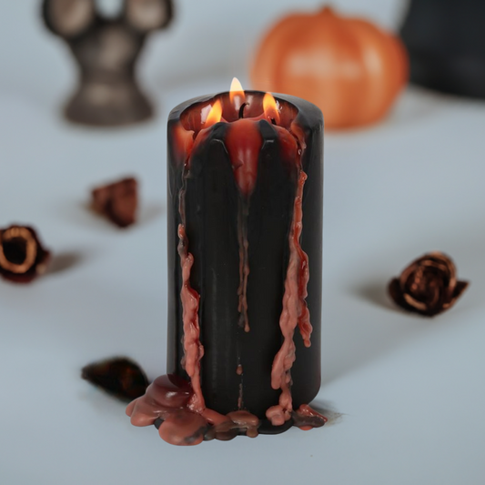 Embrace the darkness with our Vampire Tears Pillar Candle! This pillar candle gets its name from the bright red coloured wax which melts and drips after lighting the wicks