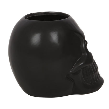 This matt black skull-shaped ceramic pot is a unique piece to finish off a gothic sink space. Perfect for holding pens, makeup brushes, toothbrushes and more