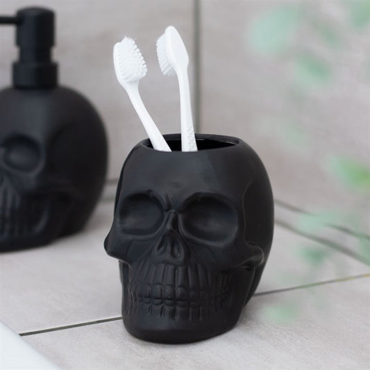 This matt black skull-shaped ceramic pot is a unique piece to finish off a gothic sink space. Perfect for holding pens, makeup brushes, toothbrushes and more