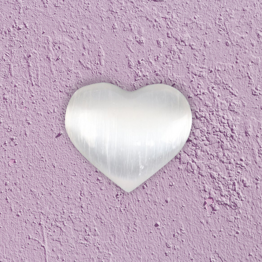 Delicate and beautiful, this crystal heart is carved from Selenite and features a stunning translucence that will be a beautiful addition to any crystal collection