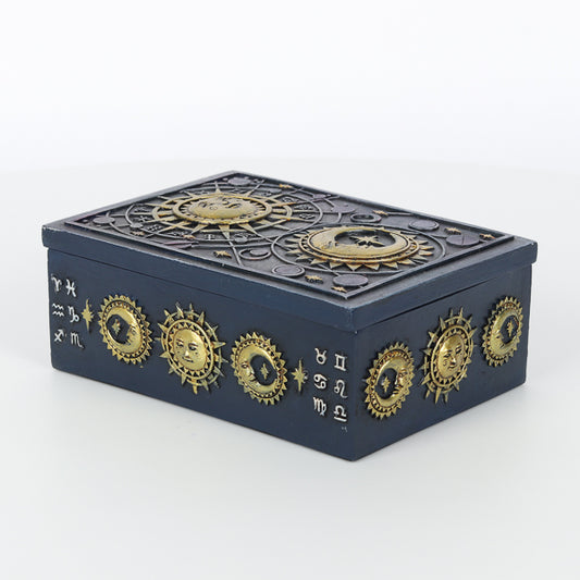 This stunning resin box is intricately designed with raised astrology symbols and a detailed sun and moon designs with a gold finish. This celestial style is perfect for holding tarot card decks, crystals, herbs and other small objects for safe keeping
