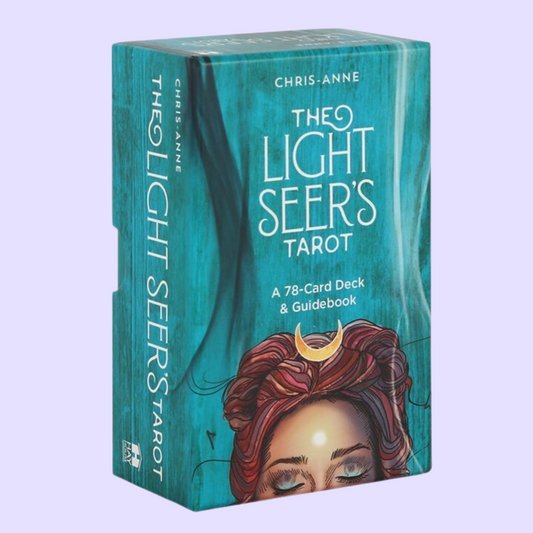 The Light Seer's Tarot card deck by Chris-Anne Donnelly includes a 78-card deck and helpful guidebook. This deck explores the power of light and darkness to help the user better understand their true nature. Beautifully presented in an illustrated box