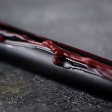 From candlelit dinners to eerie mood lighting, this set of Vampire Blood taper candles will entrance guests with their eye-catching, bleeding wax effect