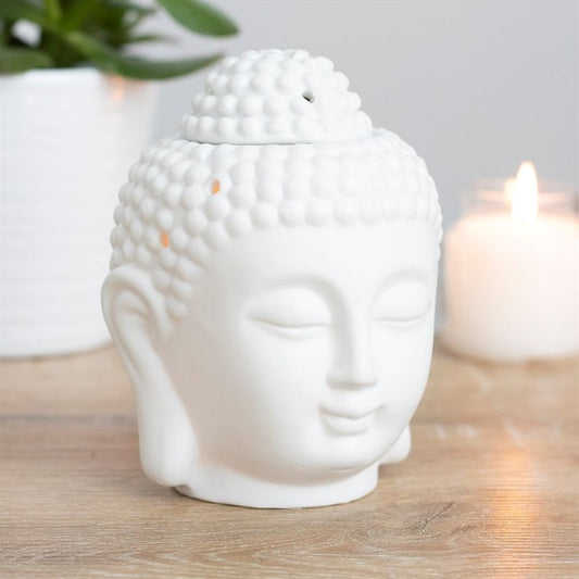 Bring peace and tranquillity to your space with this matt white ceramic Buddha Head oil and wax burner