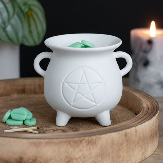 Unleash your inner magic with our White Pentagram Cauldron Oil &amp; Wax Burner! This unique burner features a pentagram design and can be used to burn both essential oils and wax melts. Perfect for setting the mood, enhancing meditation, and adding a touch of whimsy to any room