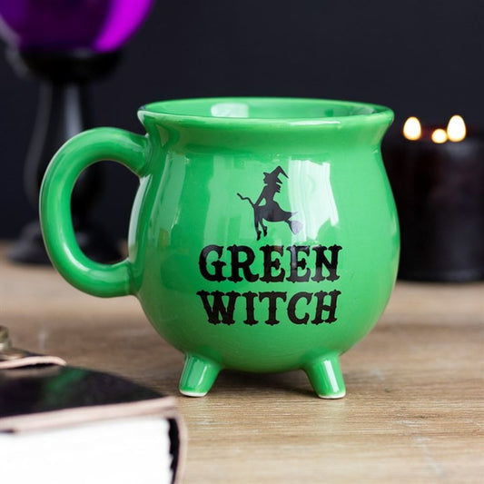 Brew up some fun with the Green Witch Cauldron Mug! This mug features a playful design of a cauldron and is perfect for any witch or wizard looking for a quirky addition to their kitchen. Sip your potions and spells in style with this unique cauldron mug. (No magic needed to enjoy!)