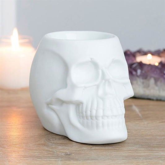 This matt white ceramic oil burner in the shape of a skull is sure to be a talking point in any home. Perfect for Halloween or for those who are looking for something different and unusual the burner features a deep bowl and can be used with both fragrance oils and wax melts