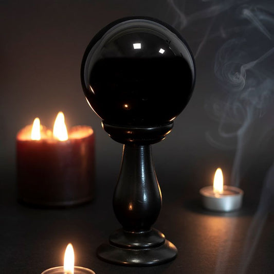 Enhance your home décor with this stunning Black Crystal Ball, made from high-quality glass this ball offers 360-degree clarity, perfect for scrying, fortune telling, or as a decorative piece