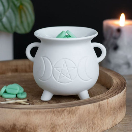 Illuminate your space with this whimsical White Triple Moon Cauldron Oil Burner. Its unique design and functionality create a cosy atmosphere while adding a touch of magic to any room. Perfect for burning your favourite oils and wax melts and creating a serene ambiance. Grab yours now and let the good vibes flow!