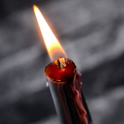 From candlelit dinners to eerie mood lighting, this set of Vampire Blood taper candles will entrance guests with their eye-catching, bleeding wax effect