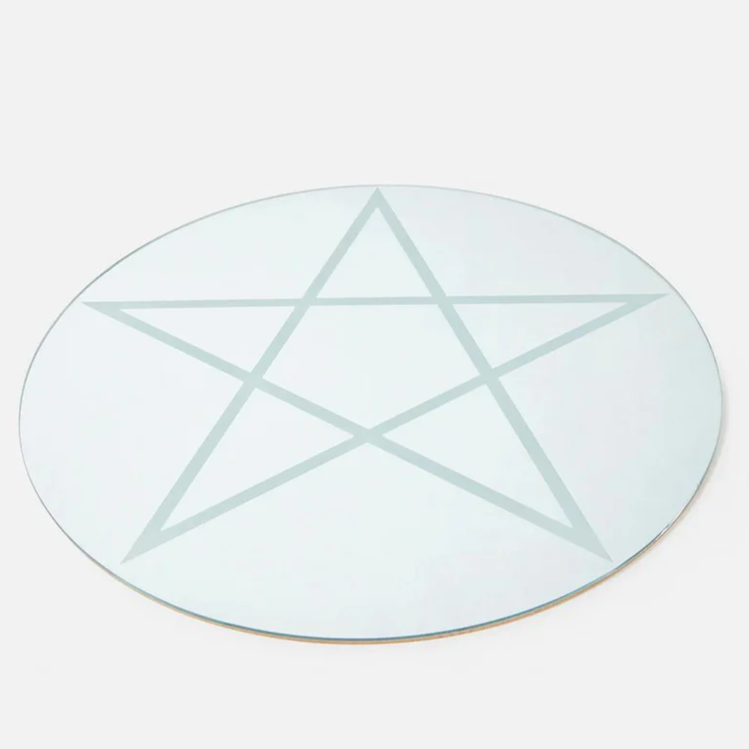 Reflect your unique style with our Round Pentagram Mirror. This eye-catching mirror features a playful pentagram design that adds a touch of whimsy to any room. Perfect for those who want to add a little magic to their home decor