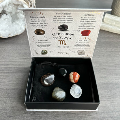 This stunning set of five crystal tumblestones are perfect for the strong, enigmatic and brave Scorpio. The set includes Smokey Quartz for emotional balancing energies, Black Obsidian for clarity, Labradorite for trust, Red Jasper for protection and Clear Quartz for balance. Beautifully presented in a magnetic closure gift box with information regarding each crystal, and a velvet drawstring bag to keep the tumblestones protected