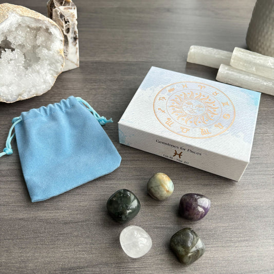 This stunning set of five crystal tumblestones are perfect for the smart, creative and deeply intuitive Pisces. The set includes Bloodstone for power, Amazonite for calming energy, Amethyst for peace, Labradorite for transformation and Clear Quartz for balance. Beautifully presented in a magnetic closure gift box with information regarding each crystal, and a velvet drawstring bag to keep the tumblestones protected