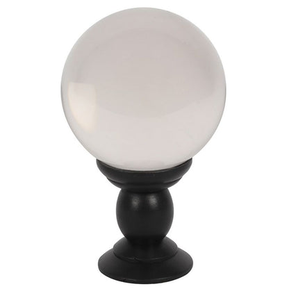 This large, clear crystal ball is not only a powerful tool in fortune telling and scrying, but also makes an eye-catching piece of d?cor. Whether used for divination or a table accessory at Halloween, this crystal ball is sure to be a conversation piece. Comes on black wooden stand