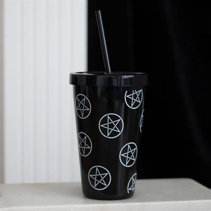 This tumbler is more than a drinkware item; it's a statement piece. The bold white pentagram design set against the sleek black background creates a striking contrast, turning an everyday object into a symbol of unique style