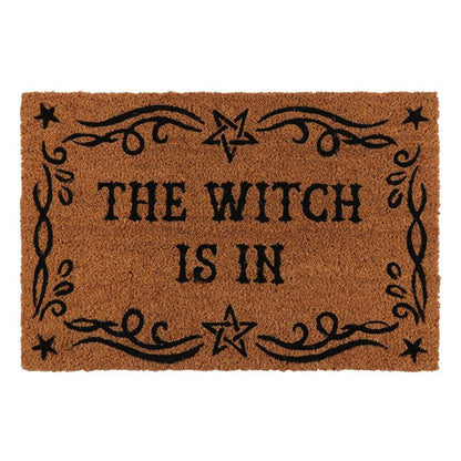 Enhance your home and create a welcoming space with this&nbsp;natural coir doormat printed with 'The Witch Is In' text and a flourished border. Makes a fun welcome at the front door of any witch's lair!